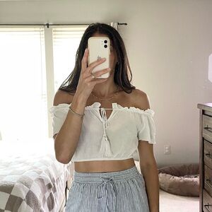 Never Worn. White tie front ruffle crop top